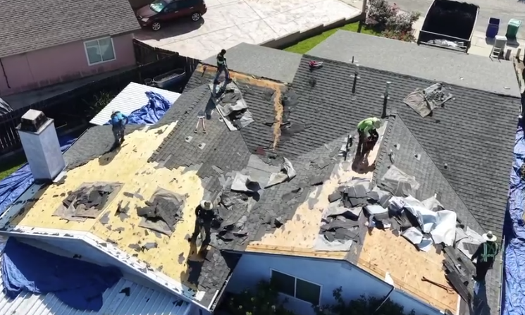 ongoing roof replacement project in mira mesa by ford roofing expert team